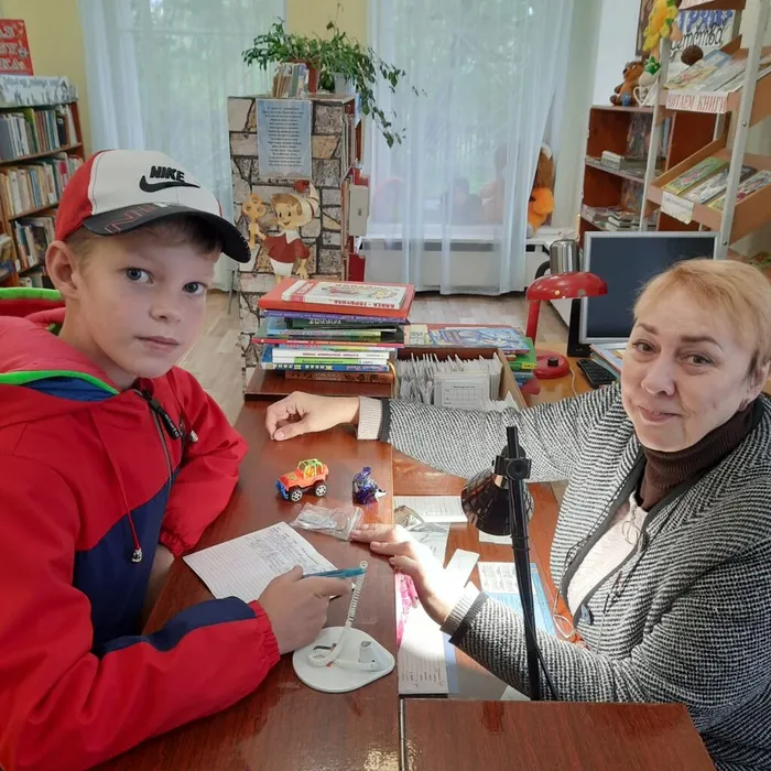 Библиотекарь и читатель